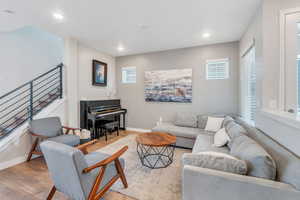 Living room with light wood-type flooring