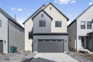 View of front of house with a garage