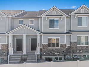 View of front of property featuring central AC