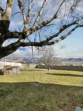 View of yard with a mountain view