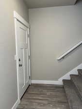 Interior space with dark wood-type flooring