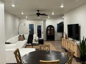 Dining room featuring ceiling fan and light hardwood / wood-style flooring