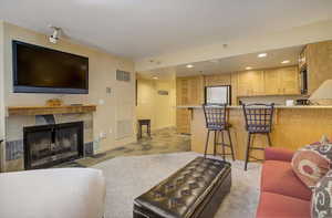 Breakfast bar and fireplace.