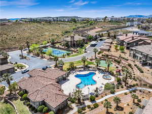 Birds eye view of property with a mountain view