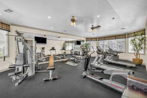 Workout area with a wealth of natural light and a textured ceiling