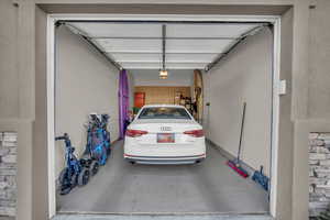 Garage featuring a garage door opener