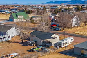 Birds eye view of property featuring a mountain view