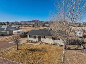 Single story home featuring a mountain view