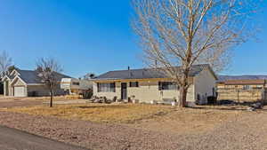 Ranch-style home with a garage