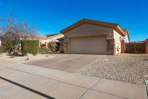 Single story home with a garage