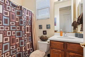 Bathroom with vanity and toilet