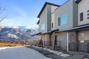 Exterior space featuring a mountain view and a porch