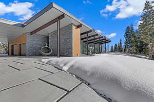 View of side of home with a garage