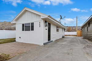 View of front of home featuring a patio