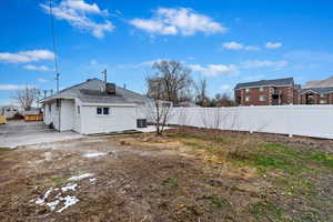 View of yard featuring cooling unit and a patio area