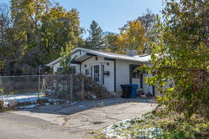 Single story home with central AC unit