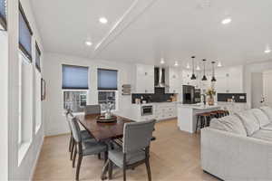 Dining room area and view of kitchen