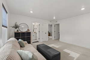 Loft corner view to full bathroom and two bedrooms