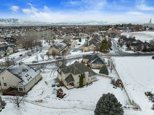 Snowy aerial view with a mountain view