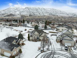 Snowy aerial view with a mountain view