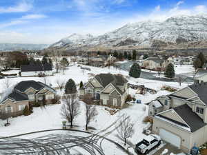 Snowy aerial view with a mountain view