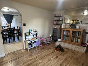 Front Room View into Dining Room, hardwood floor, natural light