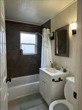 Bathroom #2 Full bathroom with shower / tub combo, vanity, toilet, and tile patterned flooring