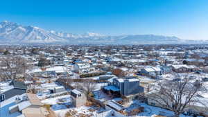 Snowy aerial view with a mountain view