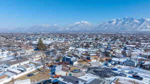 Snowy aerial view with a mountain view