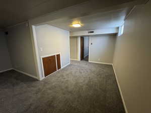 Basement with carpet