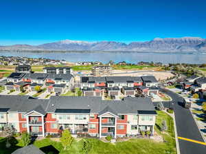 Drone / aerial view with a water and mountain view