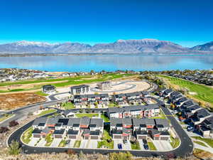 Aerial view featuring a water and mountain view