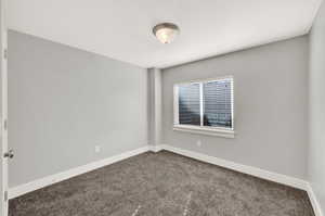 Spare room with carpet flooring