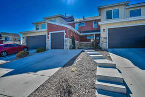 View of front facade with a garage