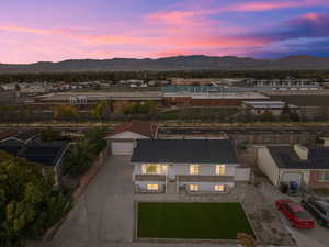 Aerial view at dusk with a mountain view