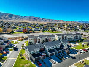 Birds eye view of property with a mountain view