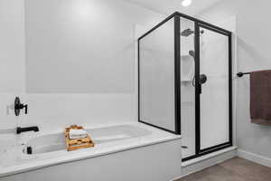 Bathroom with plus walk in shower