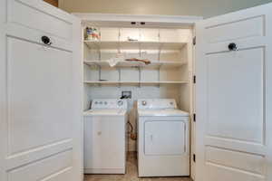 In-unit laundry area is attached to kitchen