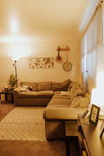 Living room featuring carpet flooring