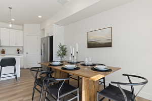 Dining area featuring light hardwood / wood-style floors