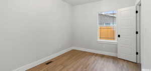 Bedroom 3 with refinished original flooring