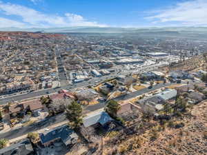 Birds eye view of property with a mountain view