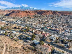 Birds eye view of property with a mountain view