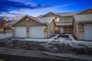 View of front of property with a garage