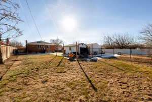 View of yard with an outbuilding