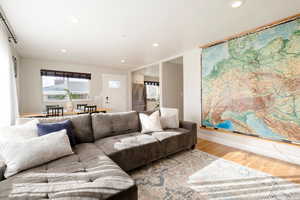 Living room with wood-type flooring