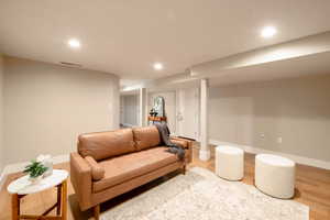 Living room featuring hardwood / wood-style flooring