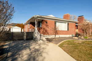 View of front of property with a front yard