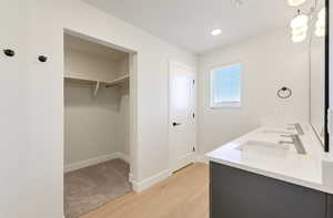 PRIMARY BATHROOM WITH WALK-IN CLOSET