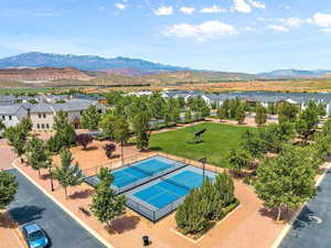 Birds eye view of property with a mountain view